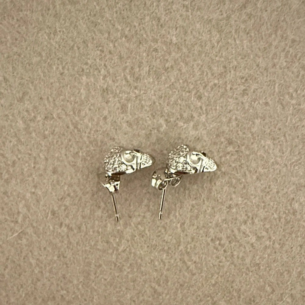 Edgy Silver Cubic zirconia Mini Skulls heads Gold plated Stud Earrings
